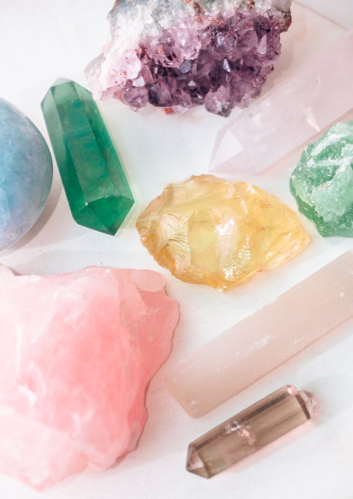 Vibrant gemstones and crystals in an artistic flat lay arrangement.